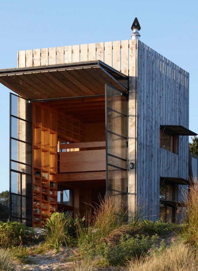 bâtiment en bois à haut plafond rassemble tous les environnements dans un seul espace