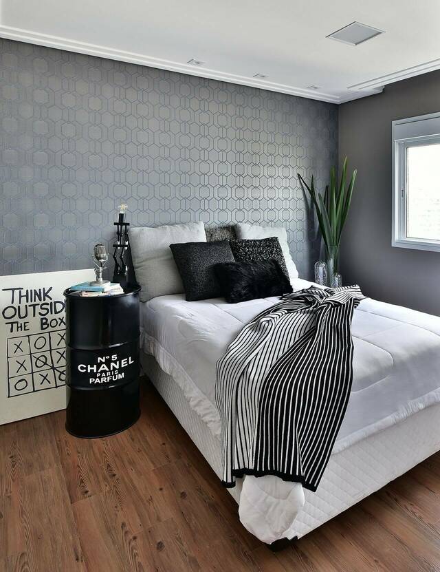 Papier peint géométrique pour chambre à coucher moderne.