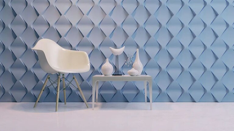 Sala de estar clara com revestimento de gesso 3D na parede Projeto de Iara Kilaris